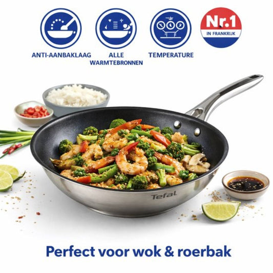 Knapperige wok-garnalen met broccoli en paprika in glanzende limoensaus bereid in Tefal Infinite wokpan.