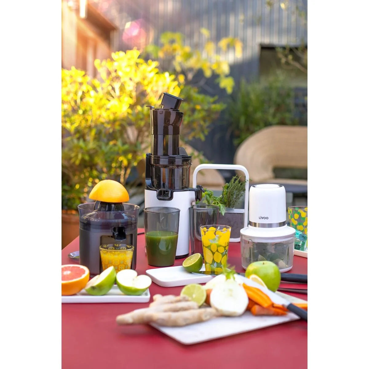 Livoo elektrische citruspers zwart sfeerbeeld citrusvruchten vers geperst sap
