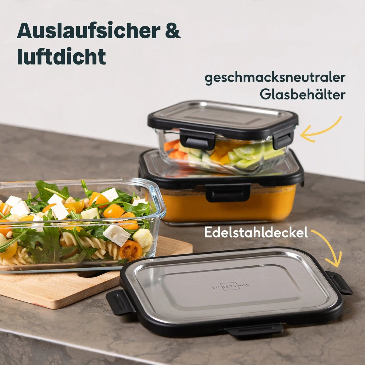 Silberthal glazen bewaarbakjes met groenten, soep en salade, met een los RVS deksel op de voorgrond.