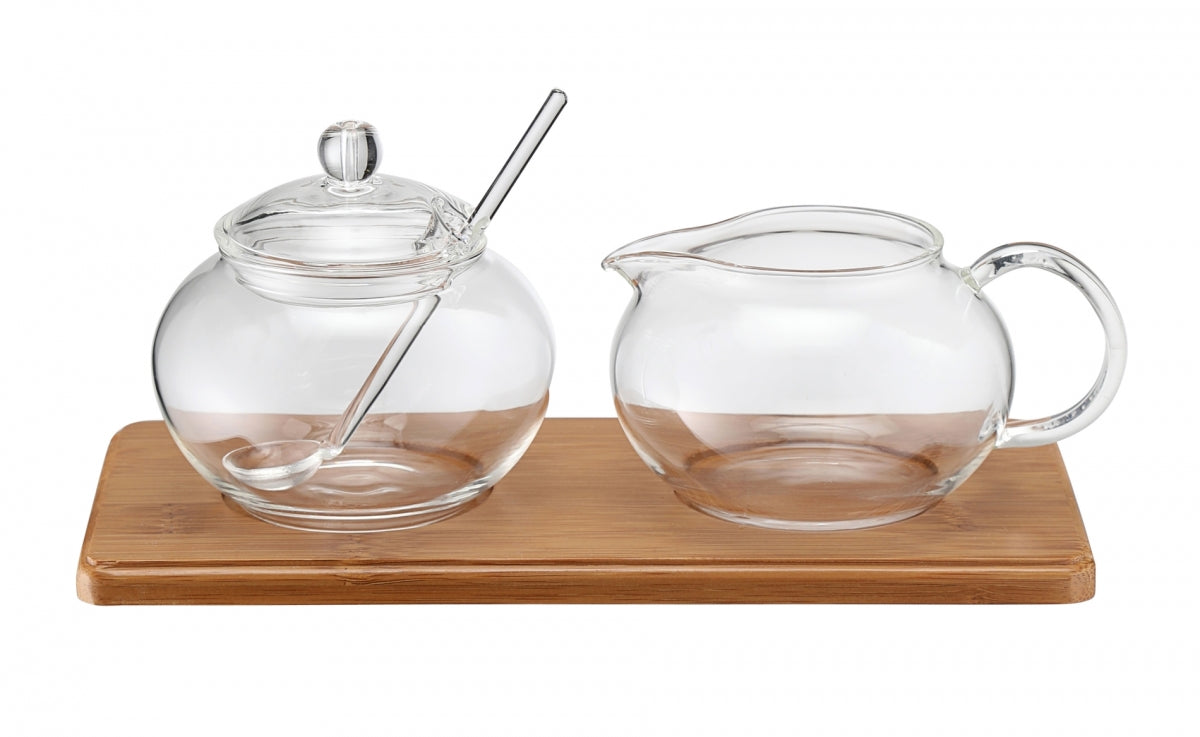 Karl Weis suikerpot en roomkannetje leeg op bamboe dienblad borosilicaatglas.