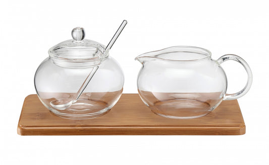 Karl Weis suikerpot en roomkannetje leeg op bamboe dienblad borosilicaatglas.