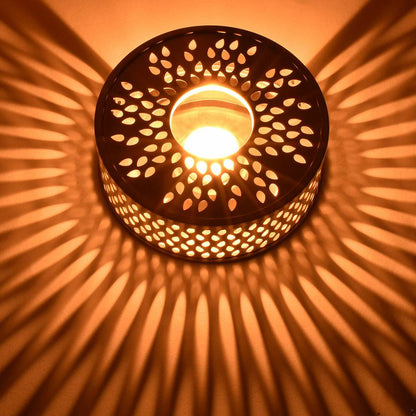 Creano warmer met druppelvormige gaten en elegant schaduwspel

